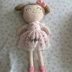 Gloveleya Smiling Plush Doll with Pink Dress and Bow